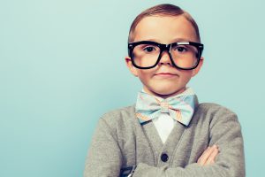 Young Nerd Boy Folding Arms and Blank Expression